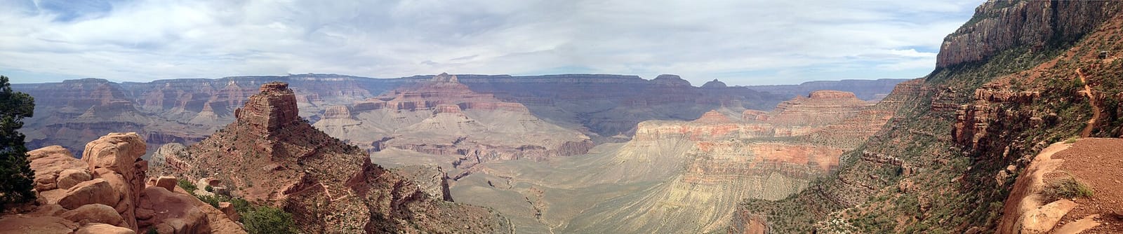 A sweeping panoramic view from Cedar Ridge on the South Rim Trail into the Grand Canyon's layered interior.