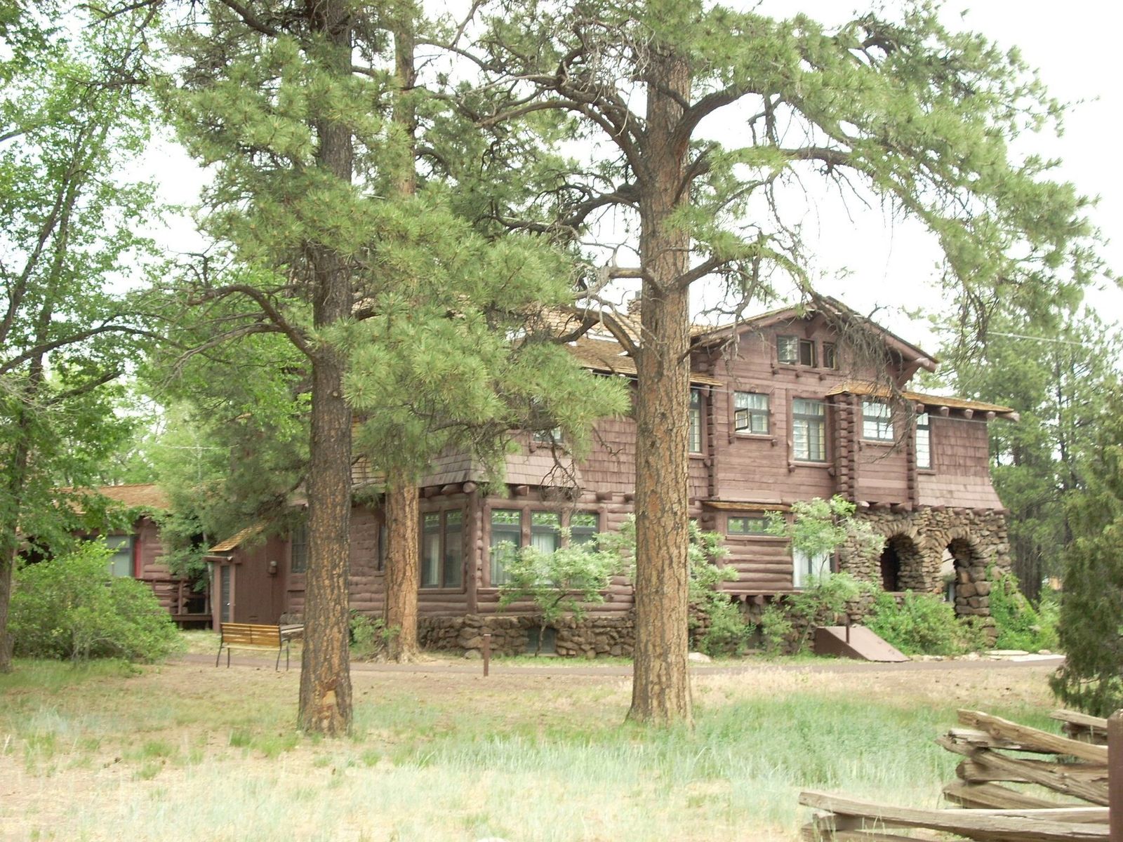 Riordan Mansion Historic Site in Flagstaff, Arizona The historic Riordan Mansion in Flagstaff, Arizona, framed by tall ponderosa pine trees near Grand Canyon country.