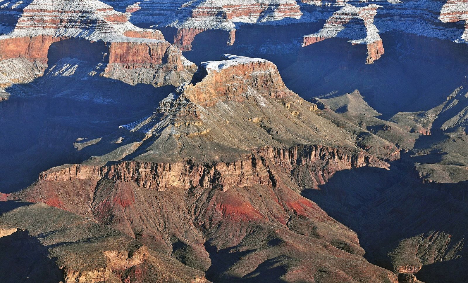 Cheops Pyramid Butte in Winter, Grand Canyon South Rim Snow-dusted Cheops Pyramid butte rises from the Grand Canyon's inner canyon in winter light.