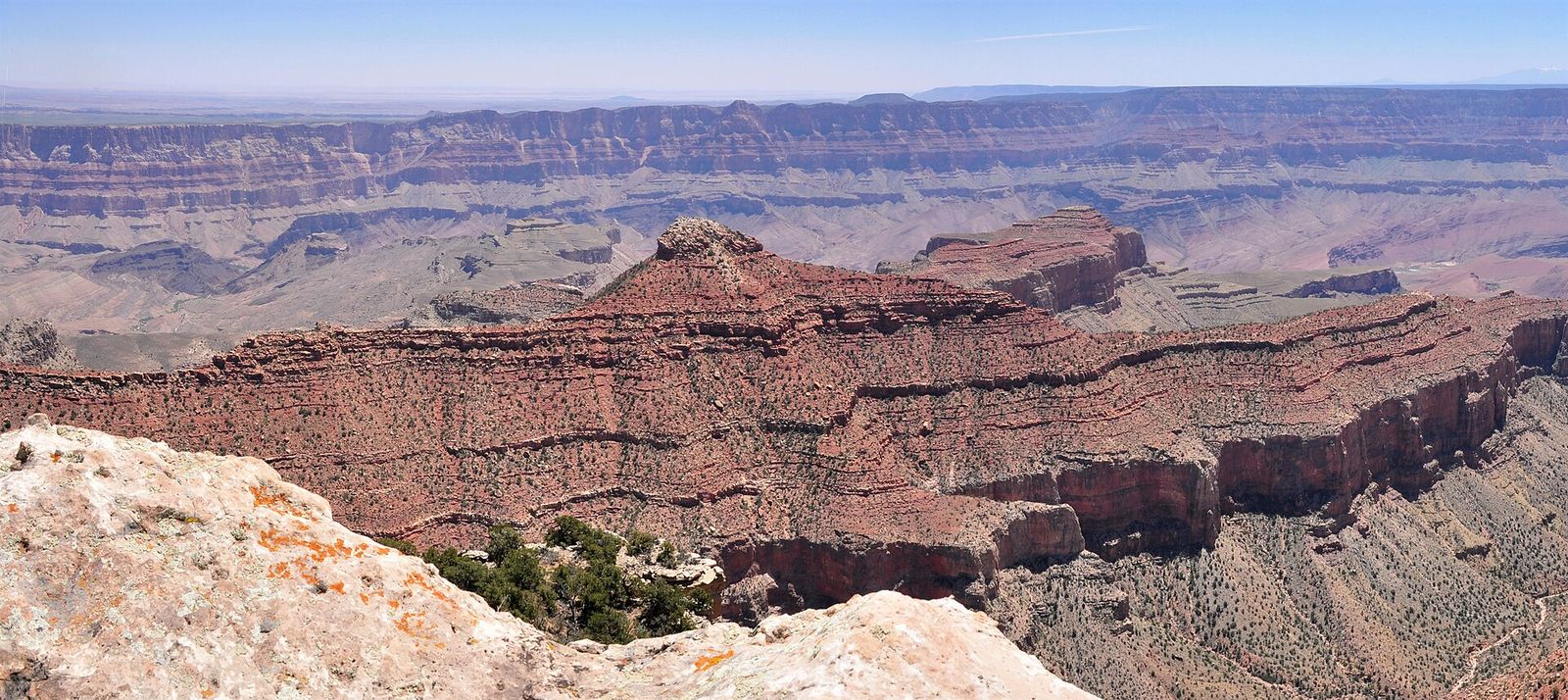 Jupiter Temple from Cape Final, North Rim A sweeping panoramic view of Jupiter Temple and layered red rock formations from Cape Final on the North Rim.