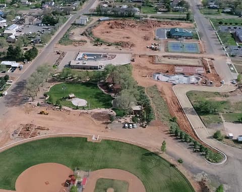 Aerial view of Jacob Hamblin Park under construction in Kanab, Utah, showing baseball fields and new amenities.